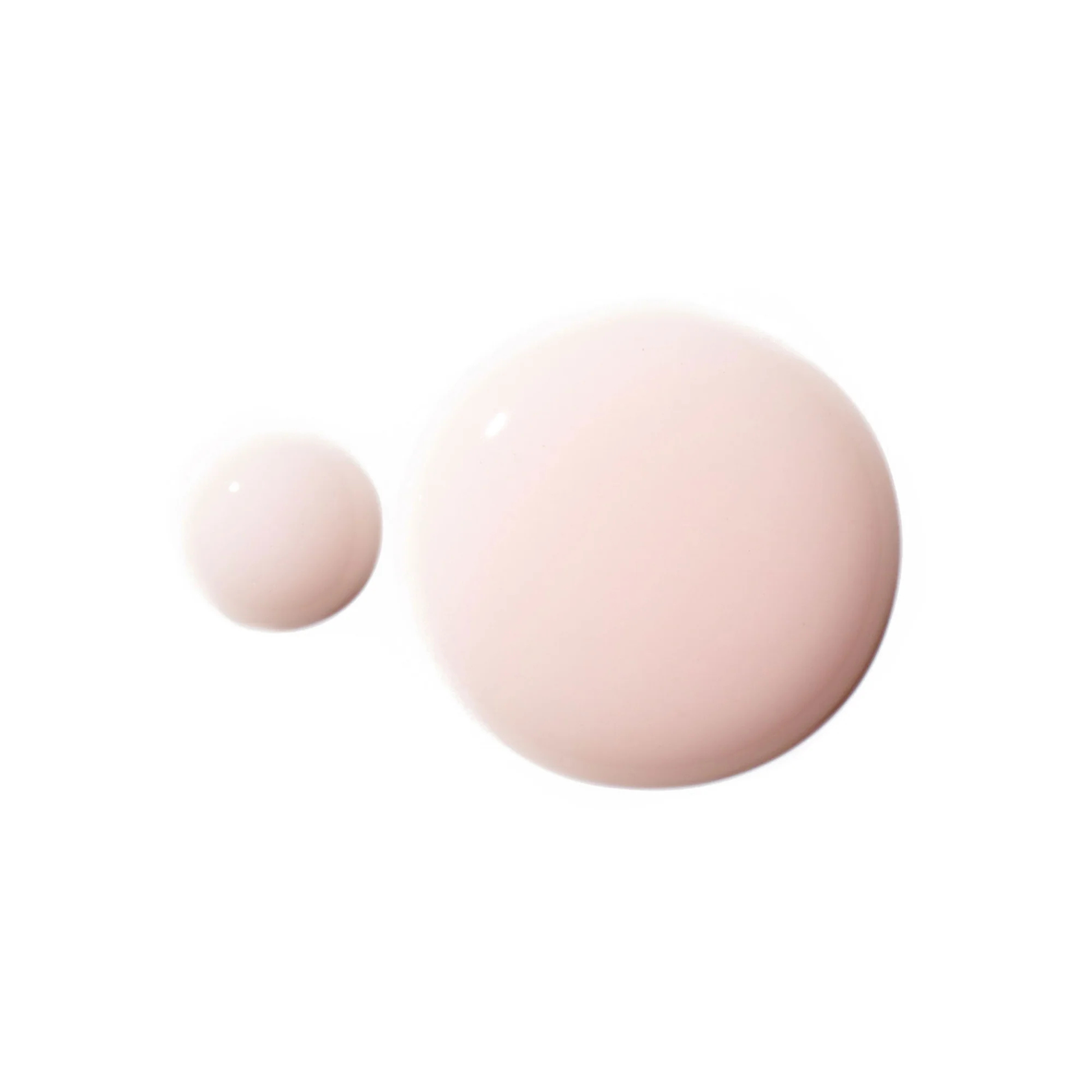 Pair of pink dots of A Primer by Serious Skincare on a white background.  Serious Skincare tube with product features on a beige background.  Helps smooth visible wrinkles, visibly fills enlarged pores, blurs surface imperfections.  Makeup glides on evenly - liquid or powder.  Oil Free. Silicone Enhanced.  Vitamin A Powered.  