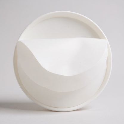 White jar of A pads - open with a light gray background