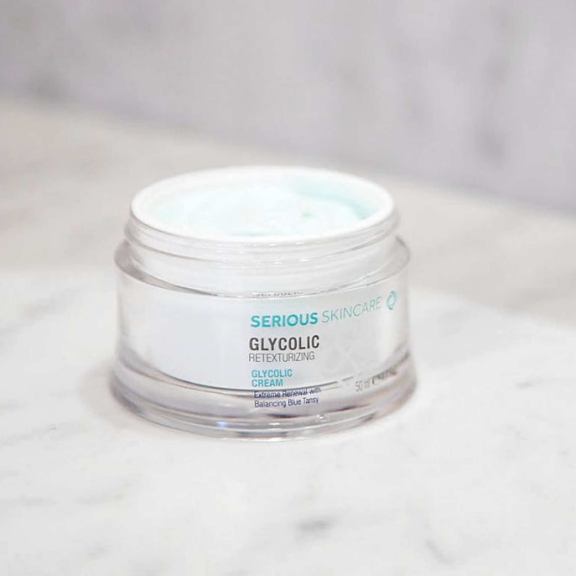 Serious Skincare Glycolic Retexturizing Cream with glycolic acid and Blue Tansy helps exfoliate, hydrate, and reveal smoother, brighter-looking skin.