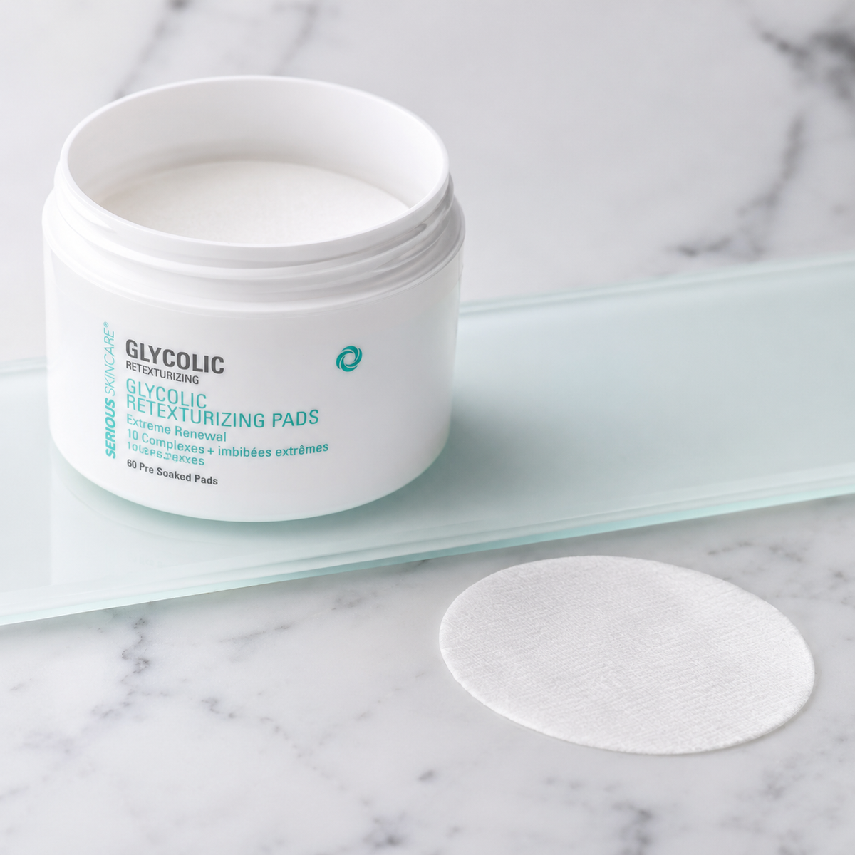 Serious Skincare Glycolic Pads exfoliating facial treatment pads with glycolic acid to smooth, brighten and refine the look of uneven skin texture.