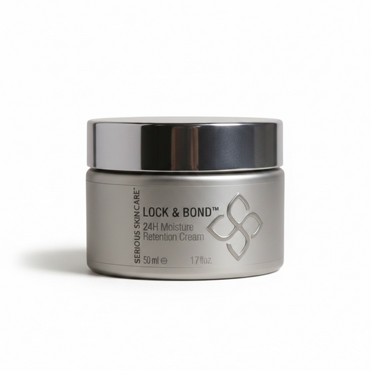 A silver cosmetic jar of Serious Skin Care Lock & Bond 24H Moisture Retention Cream, 50 ml, on a clean white background. Serious Skincare 24-Hour Lock & Bond Hydrating Cream delivers long-lasting hydration for soft, smooth, plump, and radiant-looking skin.