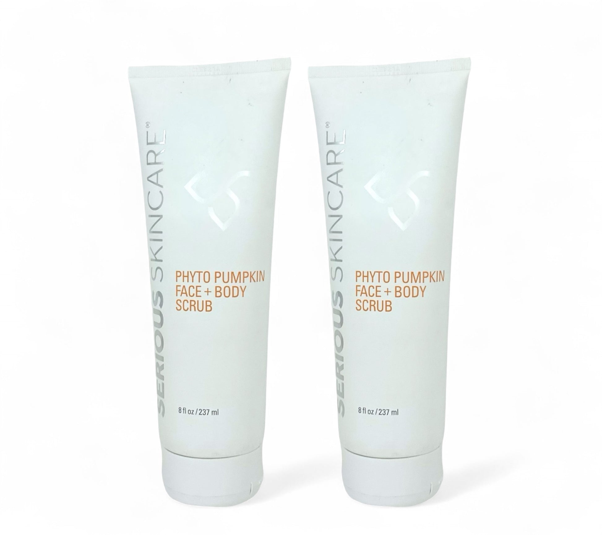 Two tubes of 'Serious Skincare' Phyto Pumpkin Face + Body Scrub on a white background