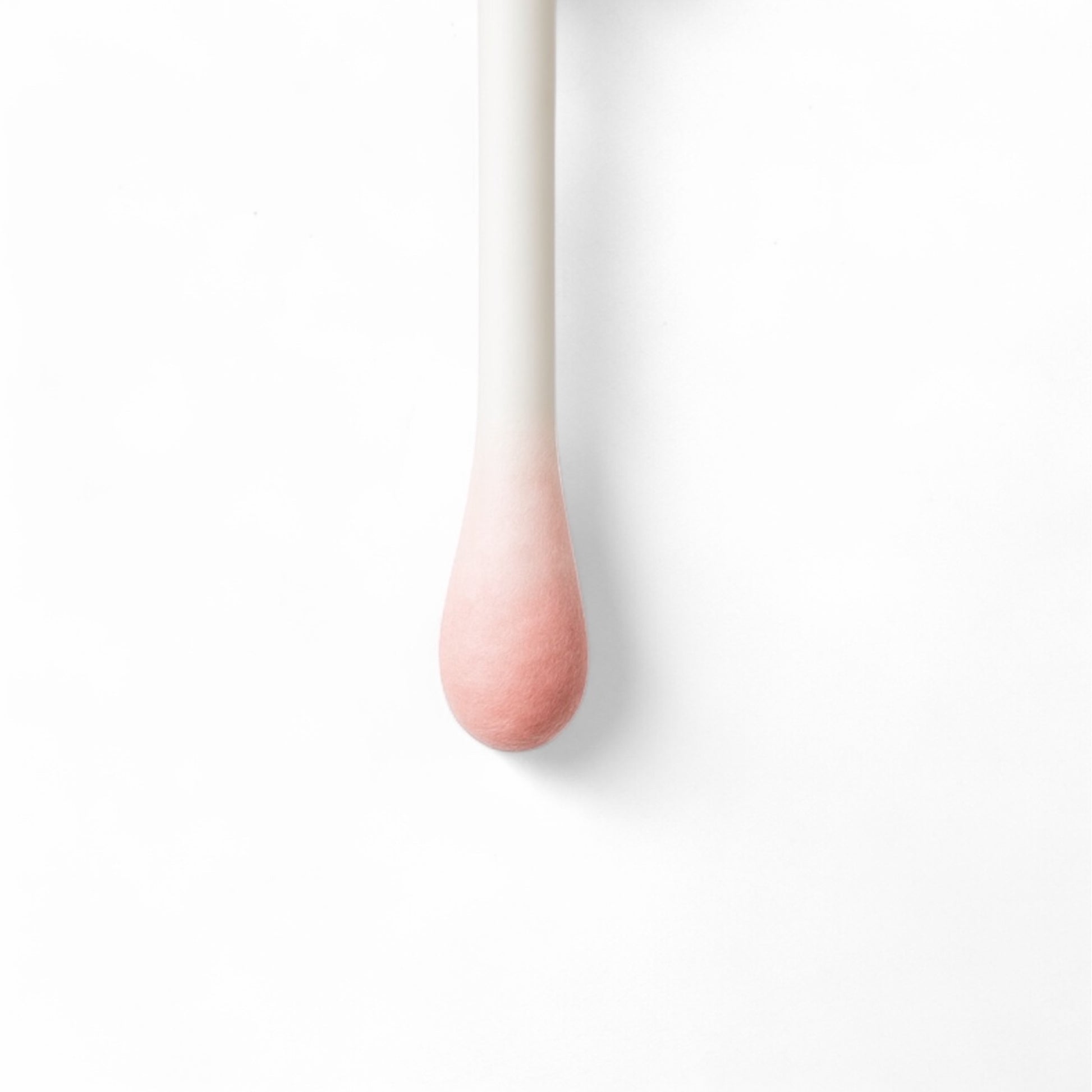 Dry Lo Exfoliating Solution - q Tip dipped in Dry Lo Solution