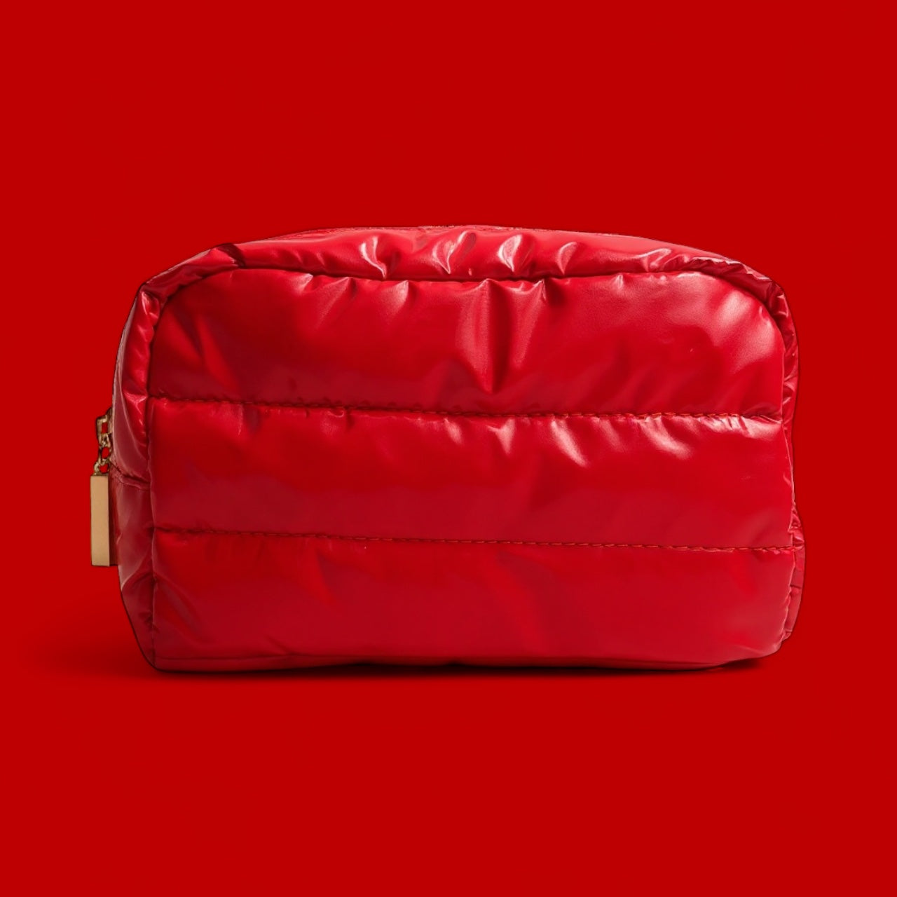 Red quilted pouch on a red background