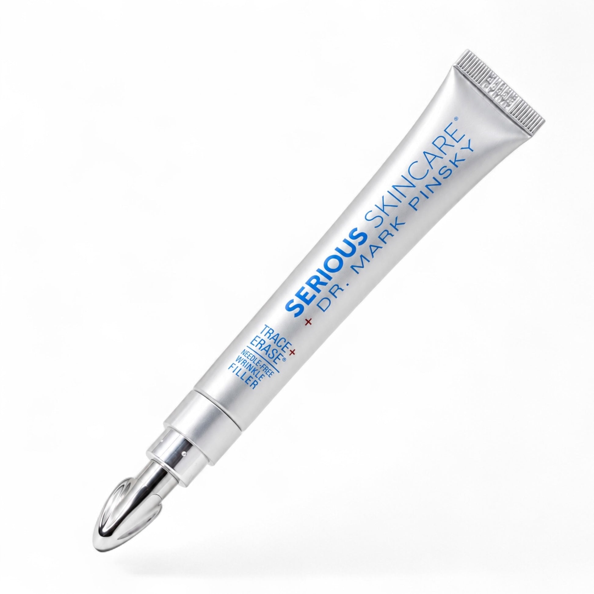 A silver squeeze tube of Serious Skincare Dr. Mark Pinsky Trace  + ERASE + Hyaluronic Acid + Botox filler, shown diagonally on a clean white background. Serious Skincare Needle-Free WRINKLE FILLER