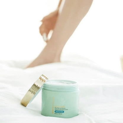 Female applying the ultra mare marine infusion body cream to her legs